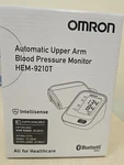Omron HEM-9210T Blood Pressure Monitor. Fixed Price $32.00.