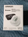 Omron Bronze Upper Arm Blood Pressure Monitor BP5150. Fixed Price $50.00.