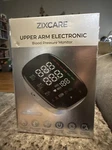 Zixcare Upper Arm Electronic Blood Pressure Monitor FC-BP103 New Sealed. Fixed Price $18.99.
