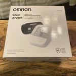 Omron Silver Argent Wireless Upper Arm Blood Pressure Monitor & Cuff - BP5250. Fixed Price $40.00.