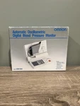 Omron Automatic Arm Blood Pressure Monitor Battery Powered HEM-704C SH22. Fixed Price $22.99.