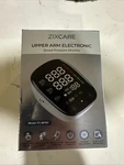 Zixcare Upper Arm Electronic Blood Pressure Monitor FC-BP103 New Sealed. Fixed Price $19.99.