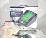 Brookstone Talking Digital Arm Blood Pressure Monitor W/ Voice Guidance 2 Users. Fixed Price $39.99.