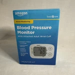 Amazon Basic Care Blood Pressure Monitor With Attached Adult Wrist Cuff Digital. Fixed Price $16.00.