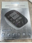 Zixcare Upper Arm Digital Blood Pressure Monitor FC-BP103 Black/white. Fixed Price $12.00.