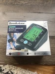 Brookstone Talking Digital Arm Blood Pressure Monitor W/ Voice Guidance 2 Users. Fixed Price $23.00.