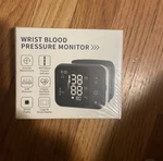 Lotfancy Wrist Blood Pressure Monitor With Case. Fixed Price $29.00.