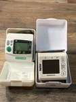 Set Wristech Digital Blood Pressure Monitor 87407 & CEN7423CS Lot With Cases. Fixed Price $19.99.